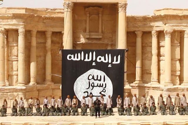 " For Obama and Cameron, a Russian-assisted recapture of Palmyra would be a humiliating lesson" Photograph: A still from the Isis-released video in Palmyra