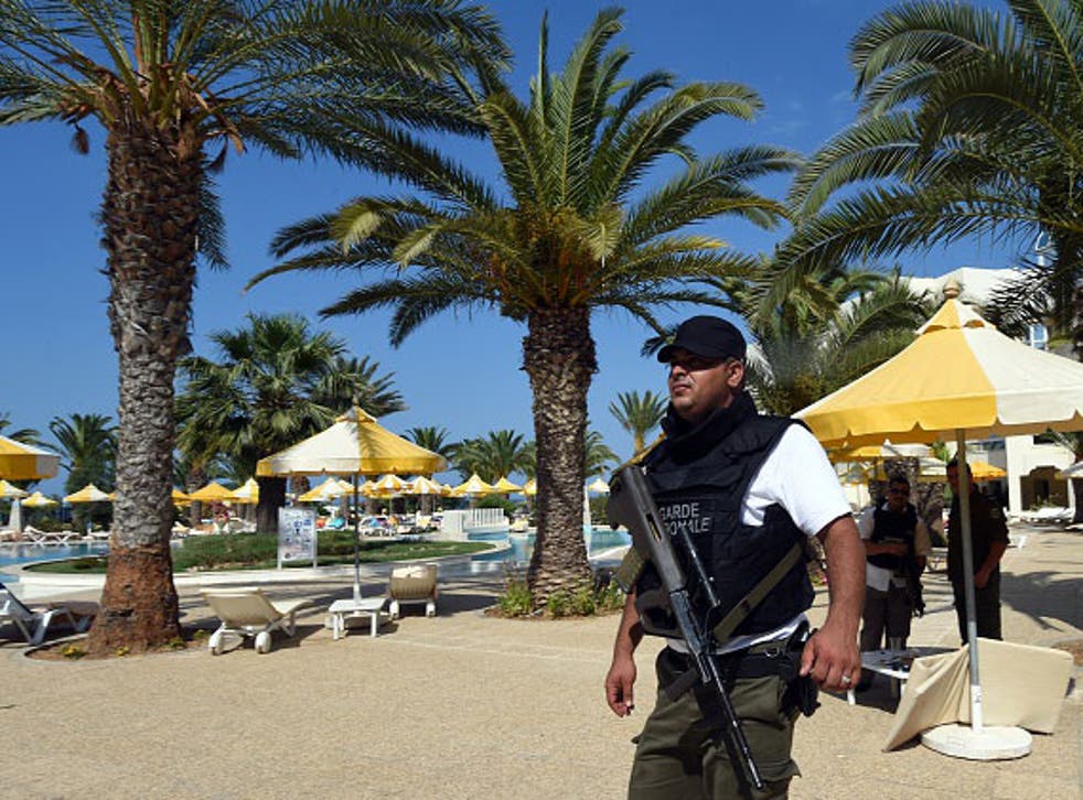 A security guard in Sousse, Tunisia where a state of emergency has been declared