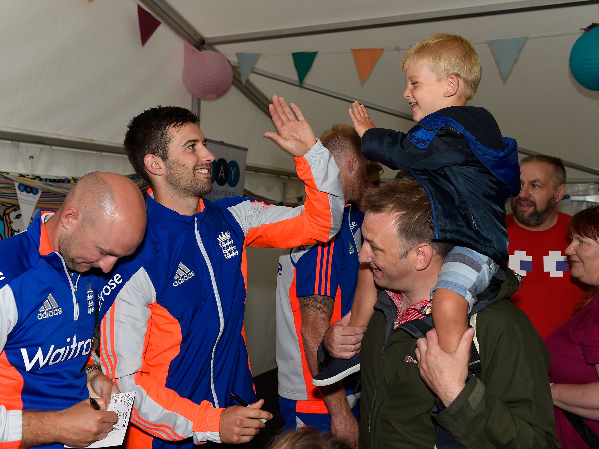Adam Lyth, left, and Mark Wood meet the fans at Cardiff Castle ahead of the first Test
