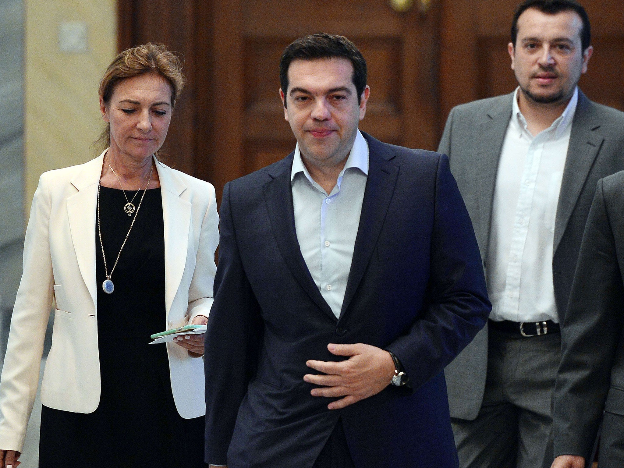 Greek Prime Minister Alexis Tsipras arrives for his meeting with the Greek political leader and the Greek President at the presidental palace in Athens