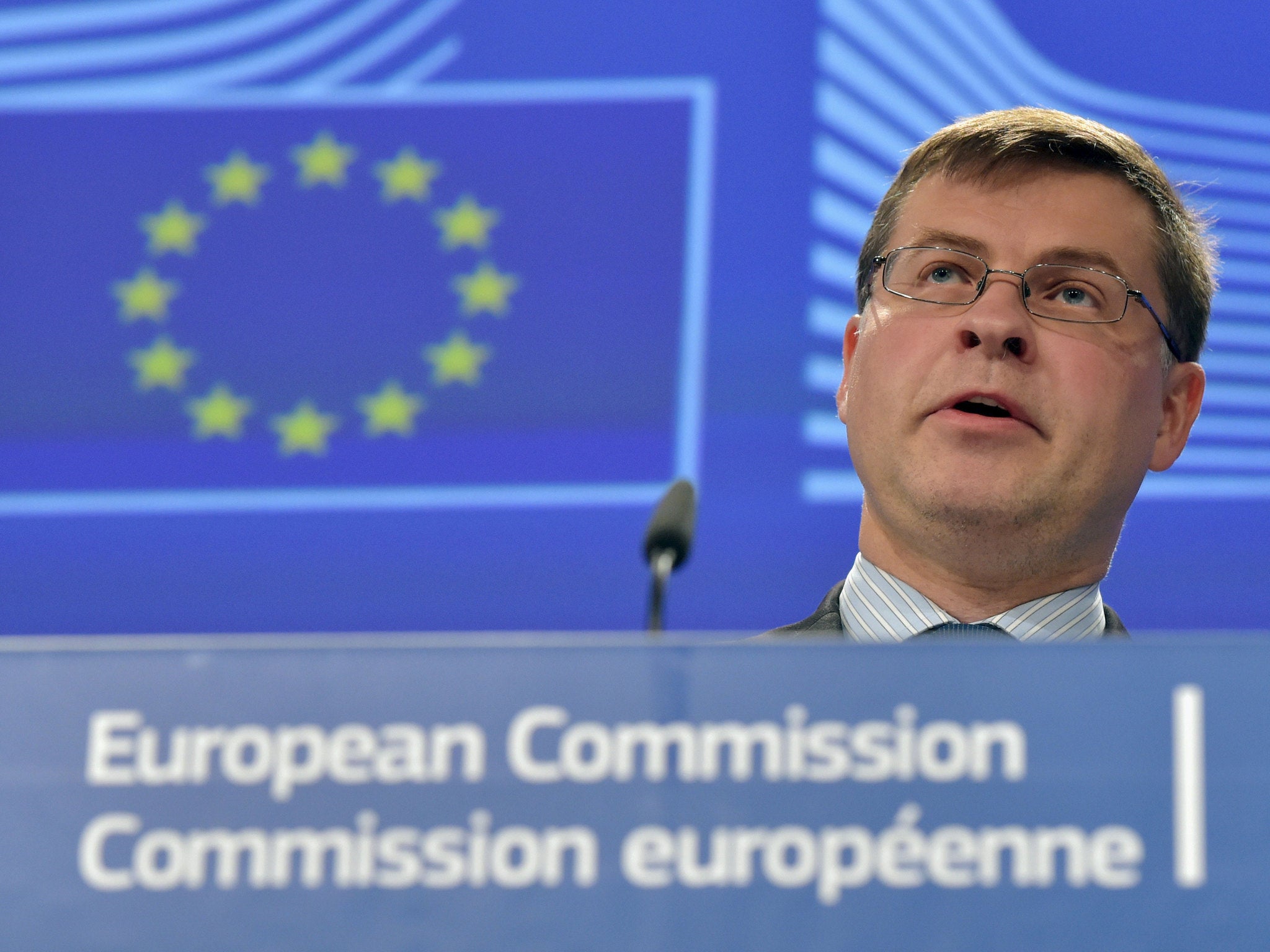 Commissioner for Euro and Social dialogue Valdis Dombrovskis gives a news conference at the EC headquarters in Brussels