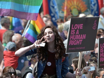 March for marriage: demonstrators in Belfast call for legislation for same sex marriage in Northern Ireland after successful referendum in the Republic