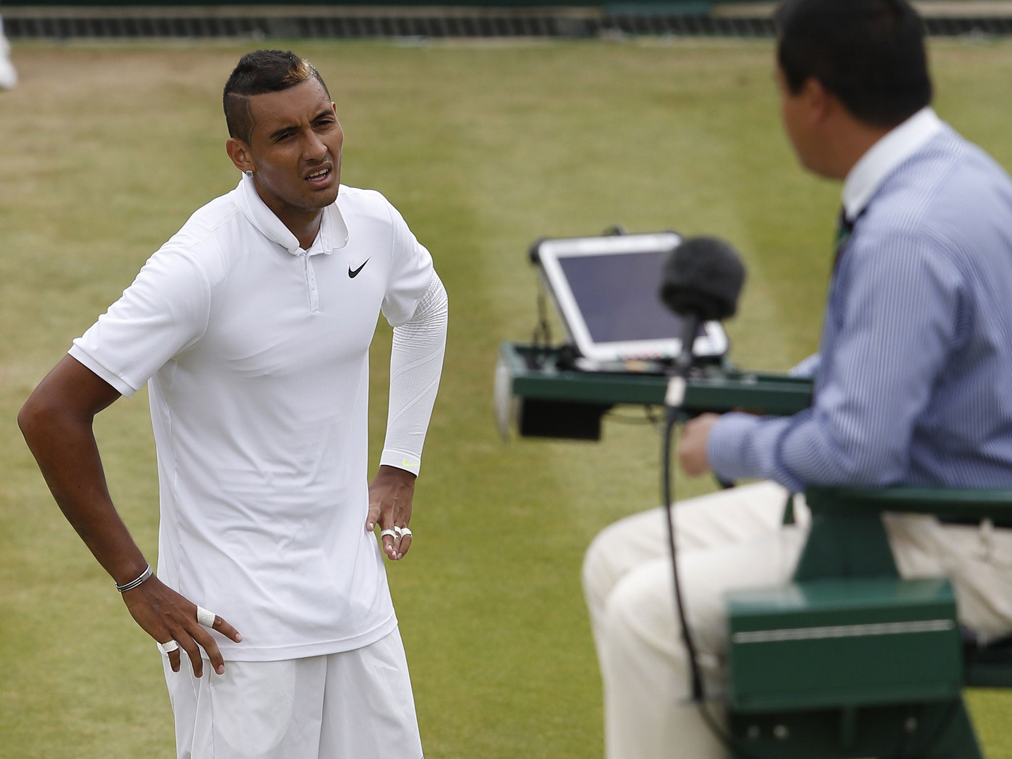 Nick Kyrgios clashes with the umpire