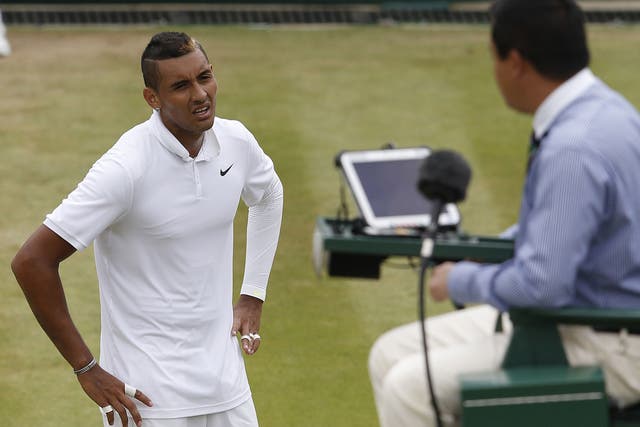 Nick Kyrgios clashes with the umpire