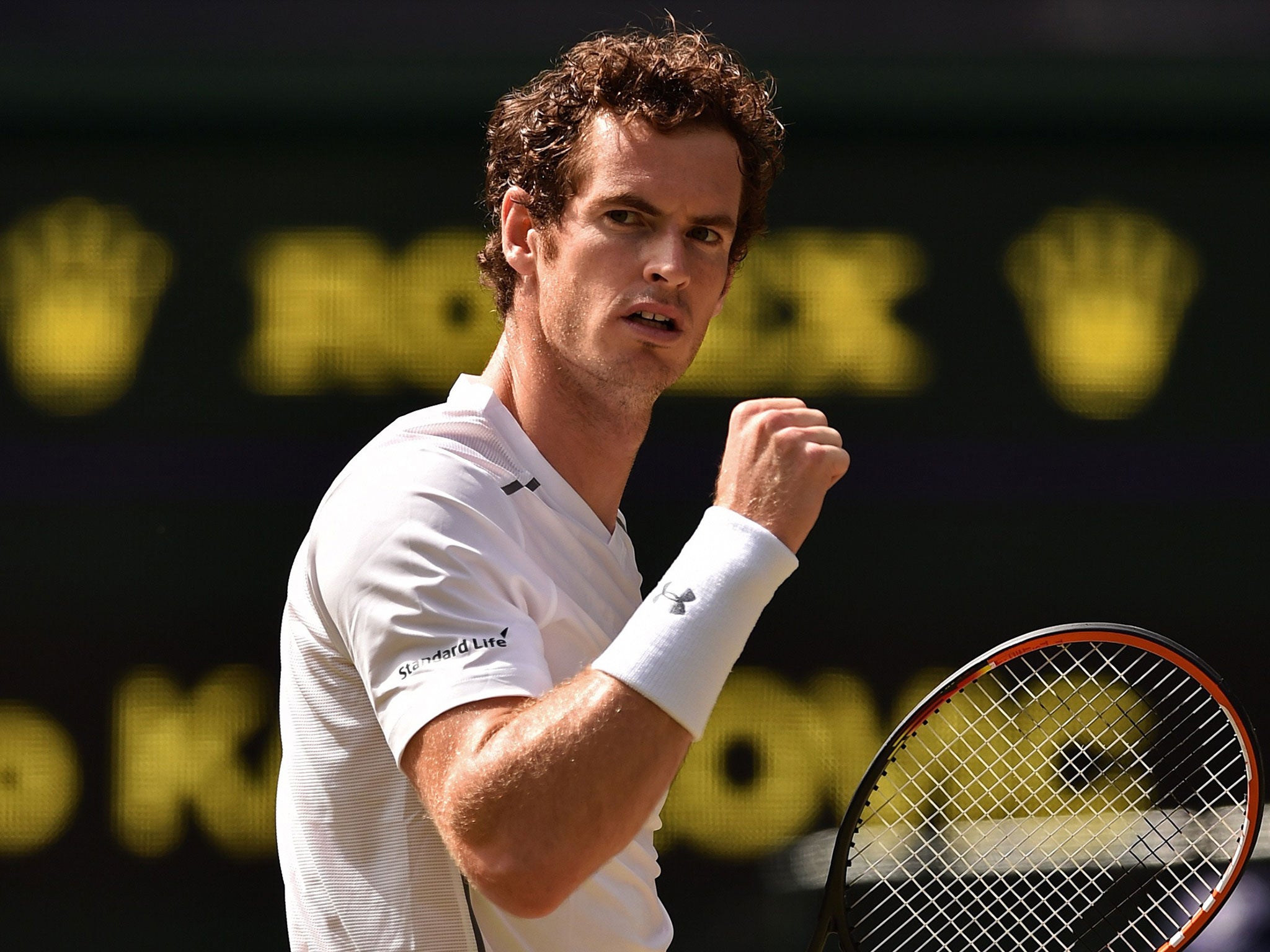Murray in action in his fourth round tie on Centre Court