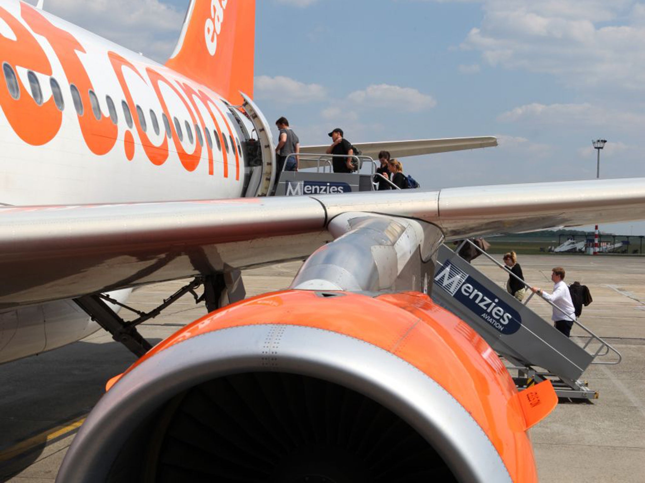 British low-cost airline easyJet raised its full-year profit forecast by around 7 per cent today after record passenger numbers in August helped to offset the higher costs the group has faced this year.