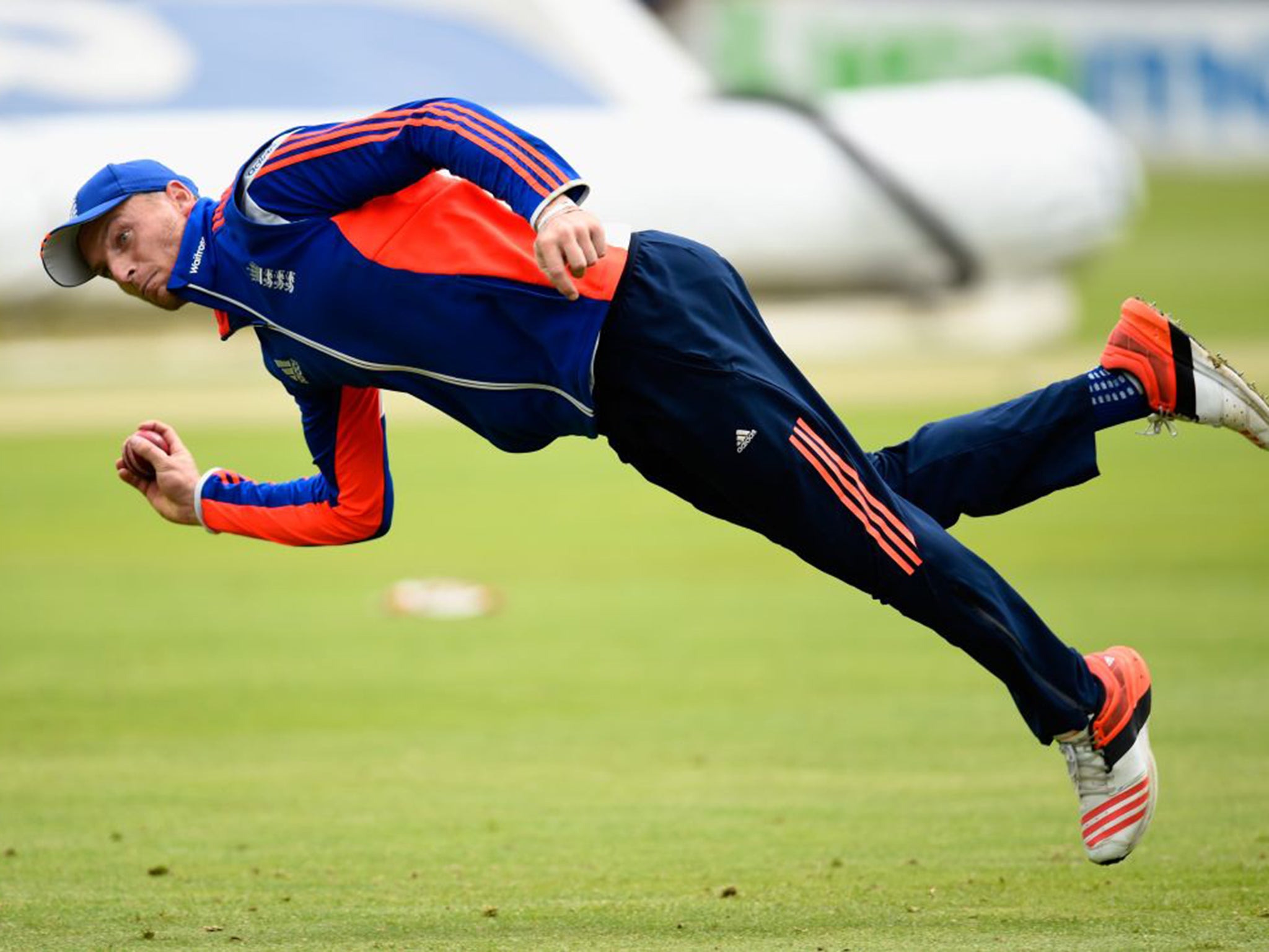 Jos Buttler takes part in a fielding drill in Cardiff on Monday