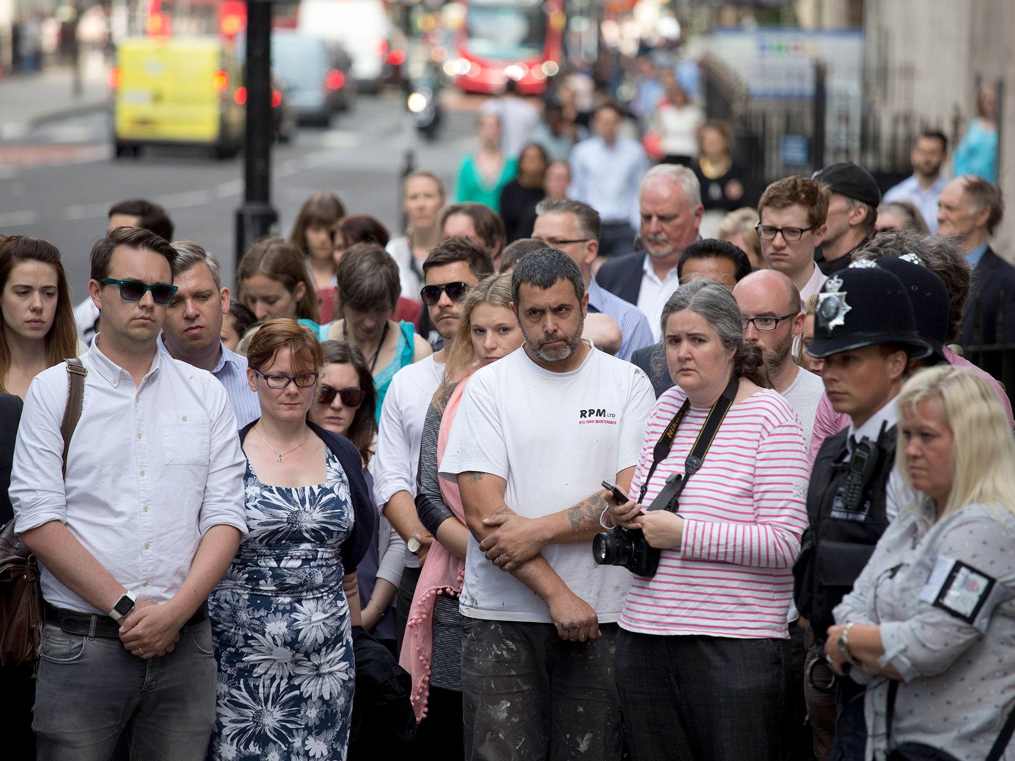 People observe a nationwide minute's silence near Tavistock Square