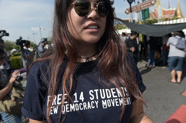 A supporter wears a T-shirt calling for the release of detained students during a protest outside the court today (via CHRISTOPHE ARCHAMBAULT/AFP/Getty Images)