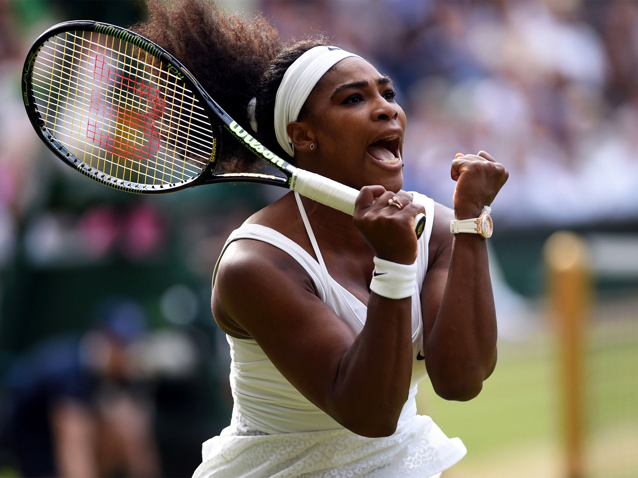 Serena Williams celebrates her victory over Victoria Azarenka