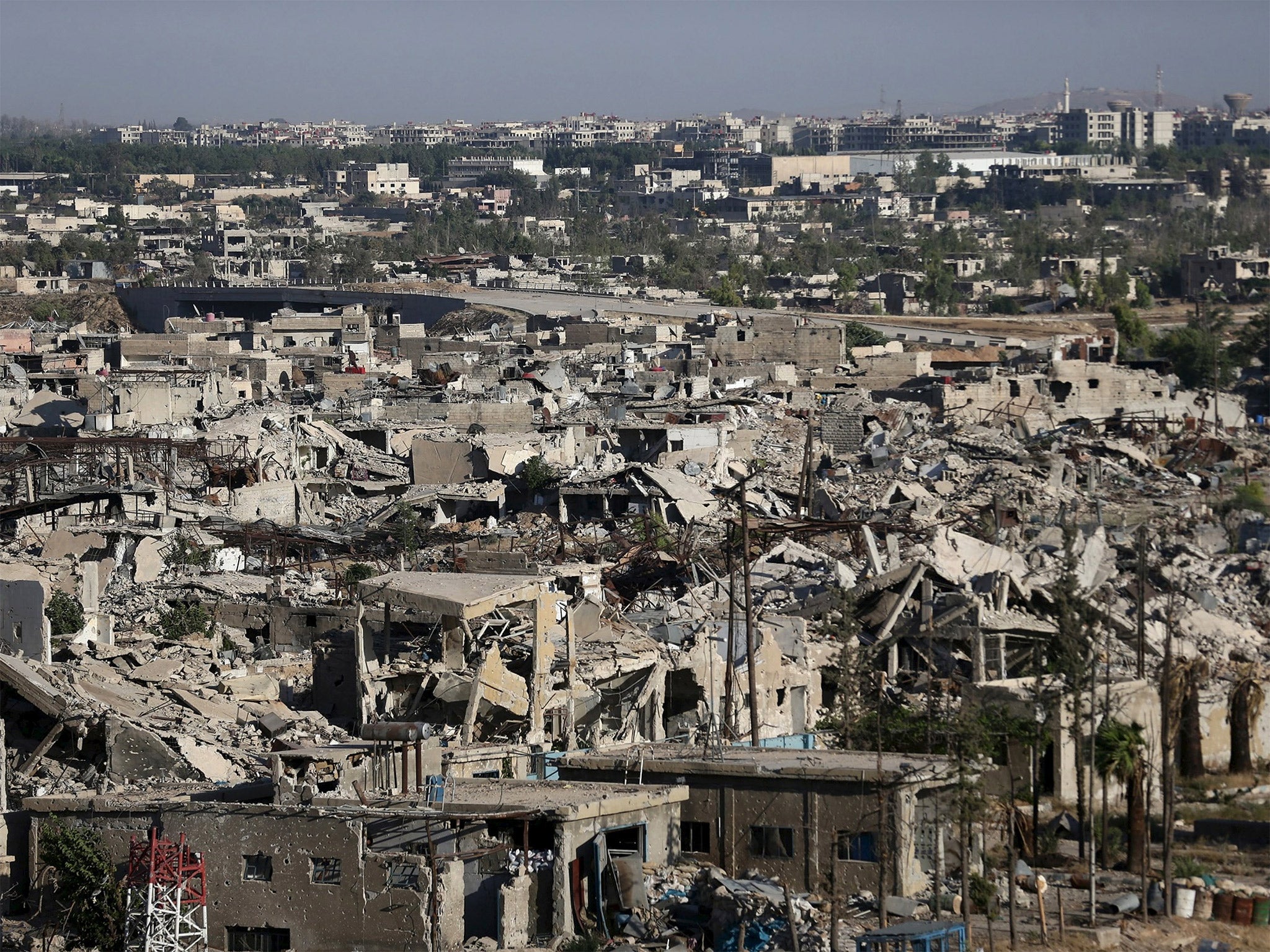 Damaged buildings in Jobar, a suburb of Damascus