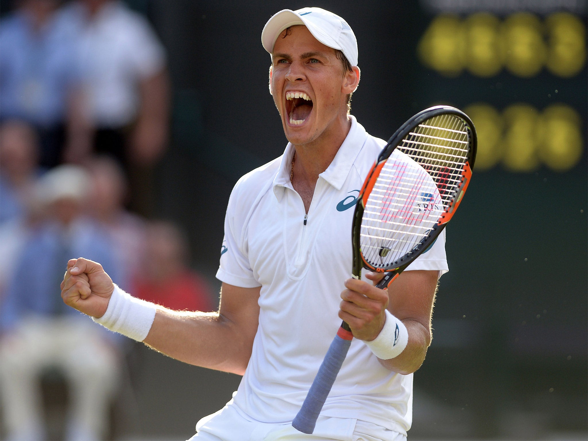 Vasek Pospisil celebrates beating James Ward in the third round last week