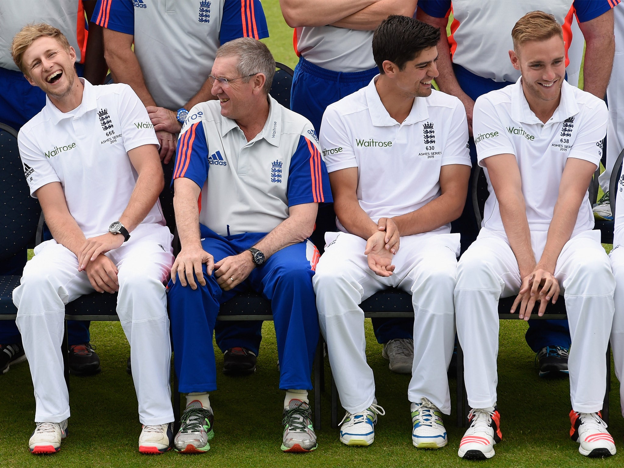 Trevor Bayliss (second left) shares a joke with the England players