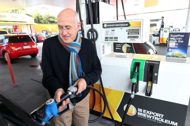 A driver fills up his car with Brewtroluem biofuel in New Zealand