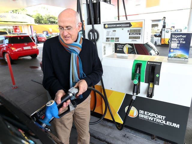 A driver fills up his car with Brewtroluem biofuel in New Zealand