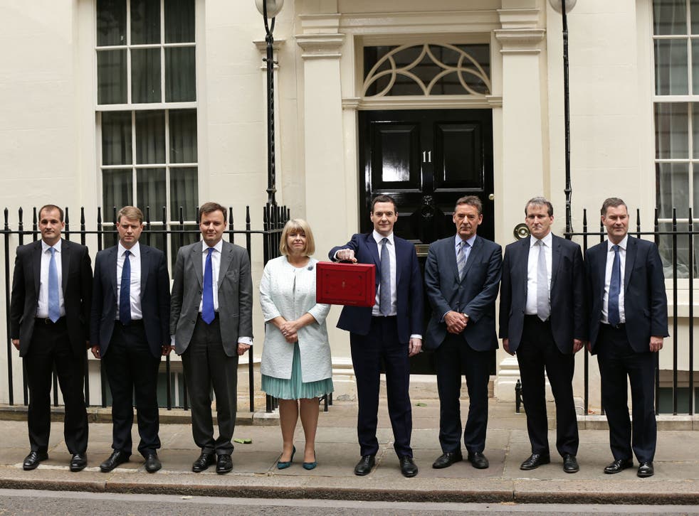 George Osborne with his Treasury team outside 11 Downing Street, London, before heading to the House of Commons to deliver his first Tory-only Budget 
