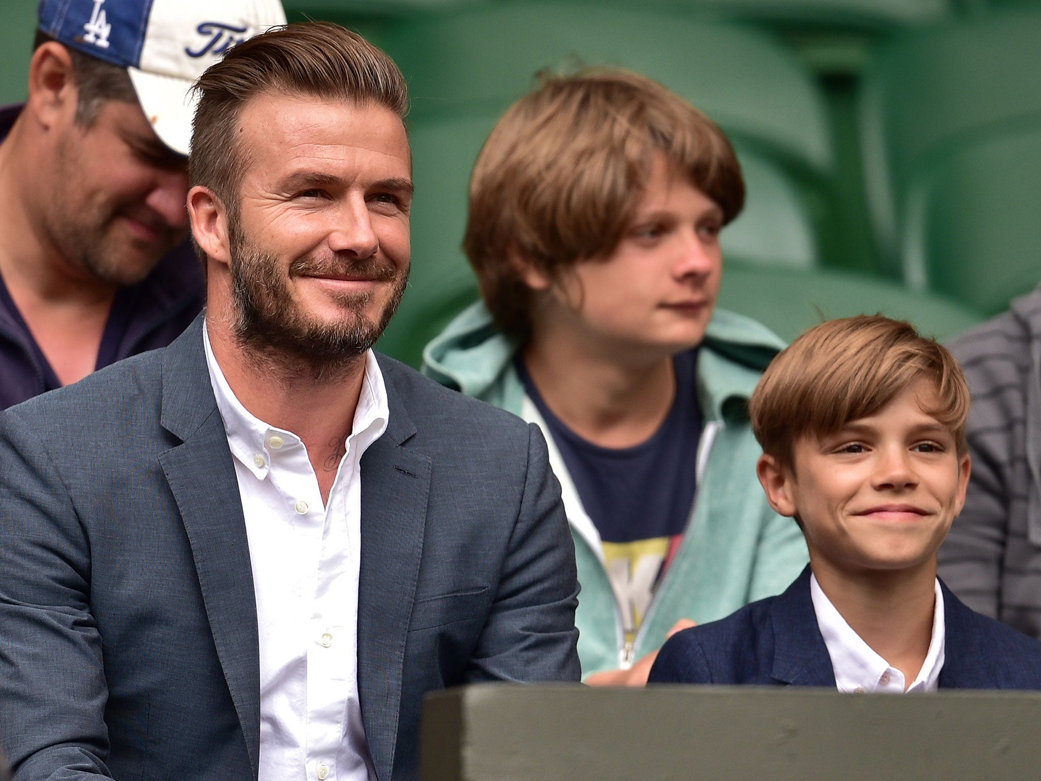 David Beckham and son Romeo watch Andy Murray