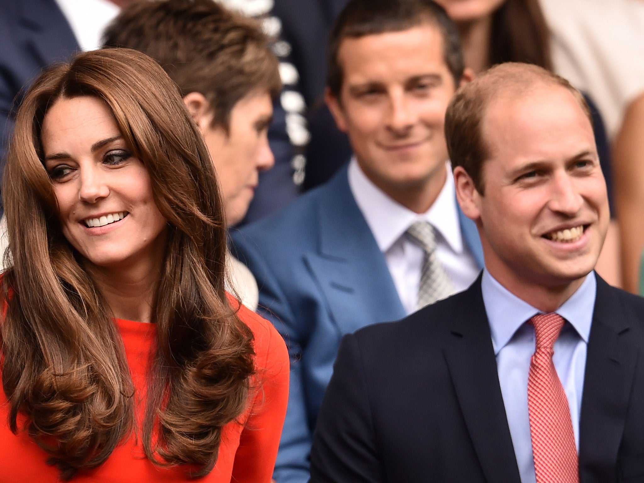 The Dutchess and Duke of Cambridge look on