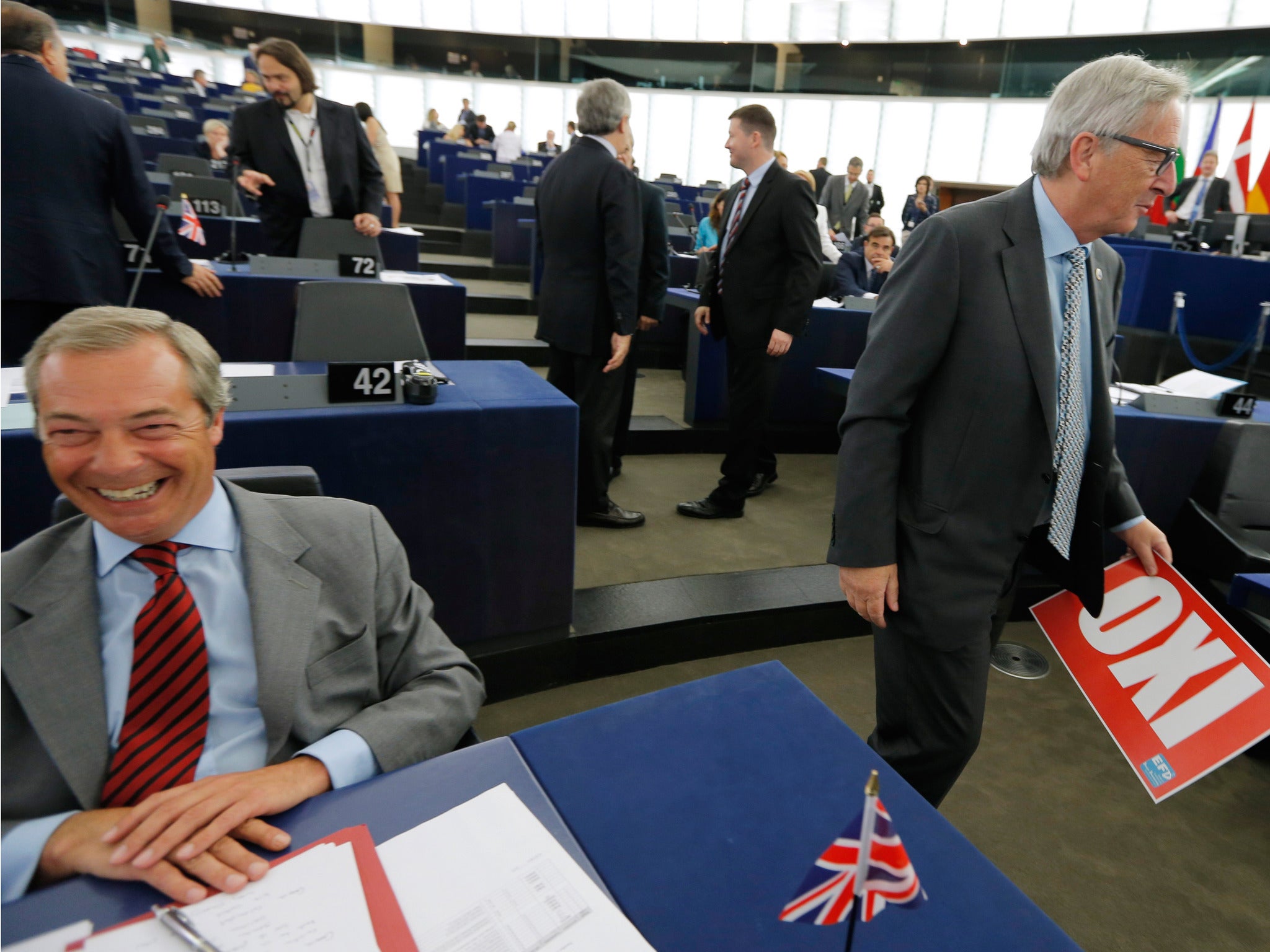 Farage kept the 'no' vote banner on his desk, until Commission president Junker confiscated it