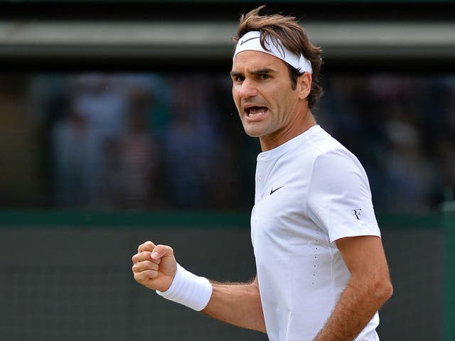 Roger Federer celebrates his win over Gilles Simon