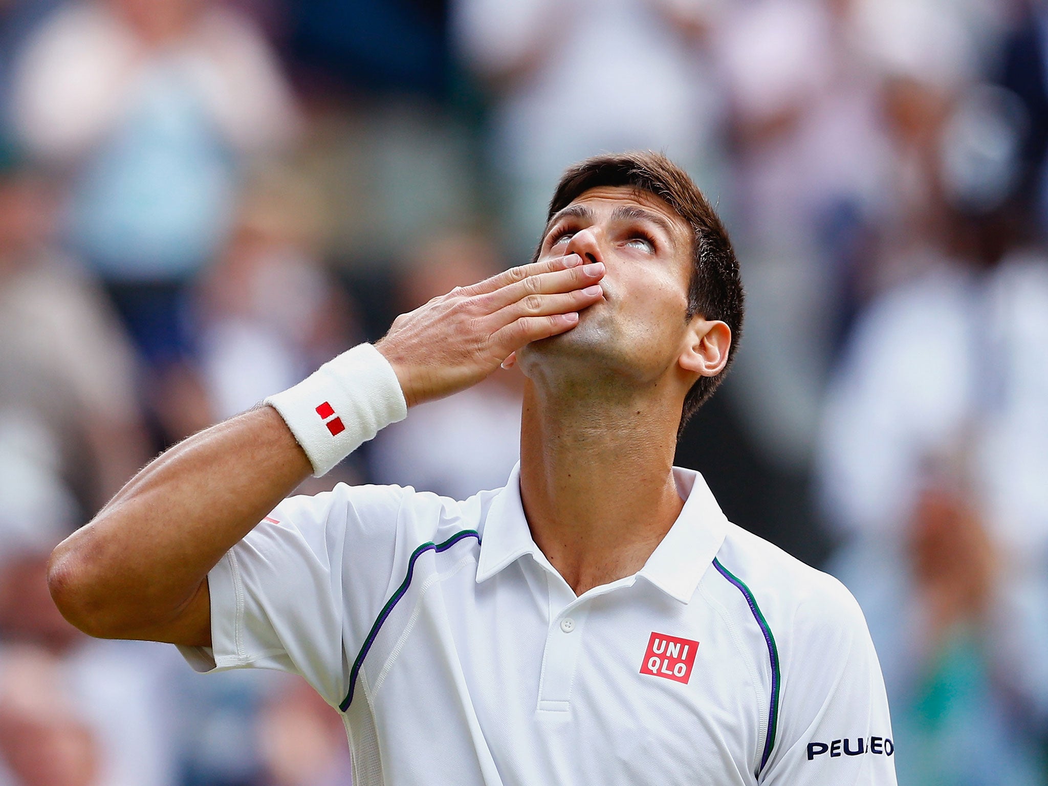 Novak Djokovic celebrates his win over Marin Cilic