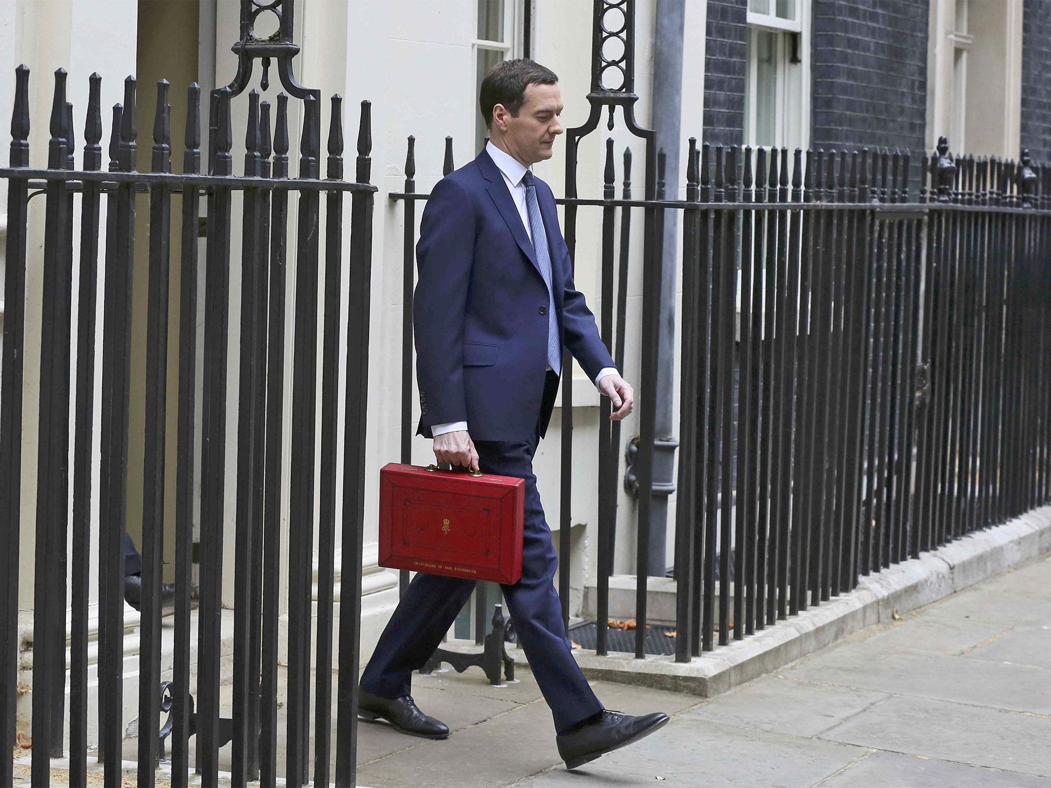 George Osborne walks out of number 11 Downing Street before delivering his budget