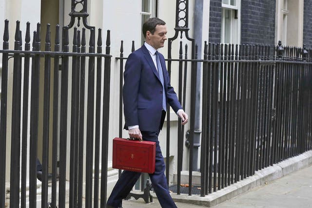 George Osborne walks out of number 11 Downing Street before delivering his budget