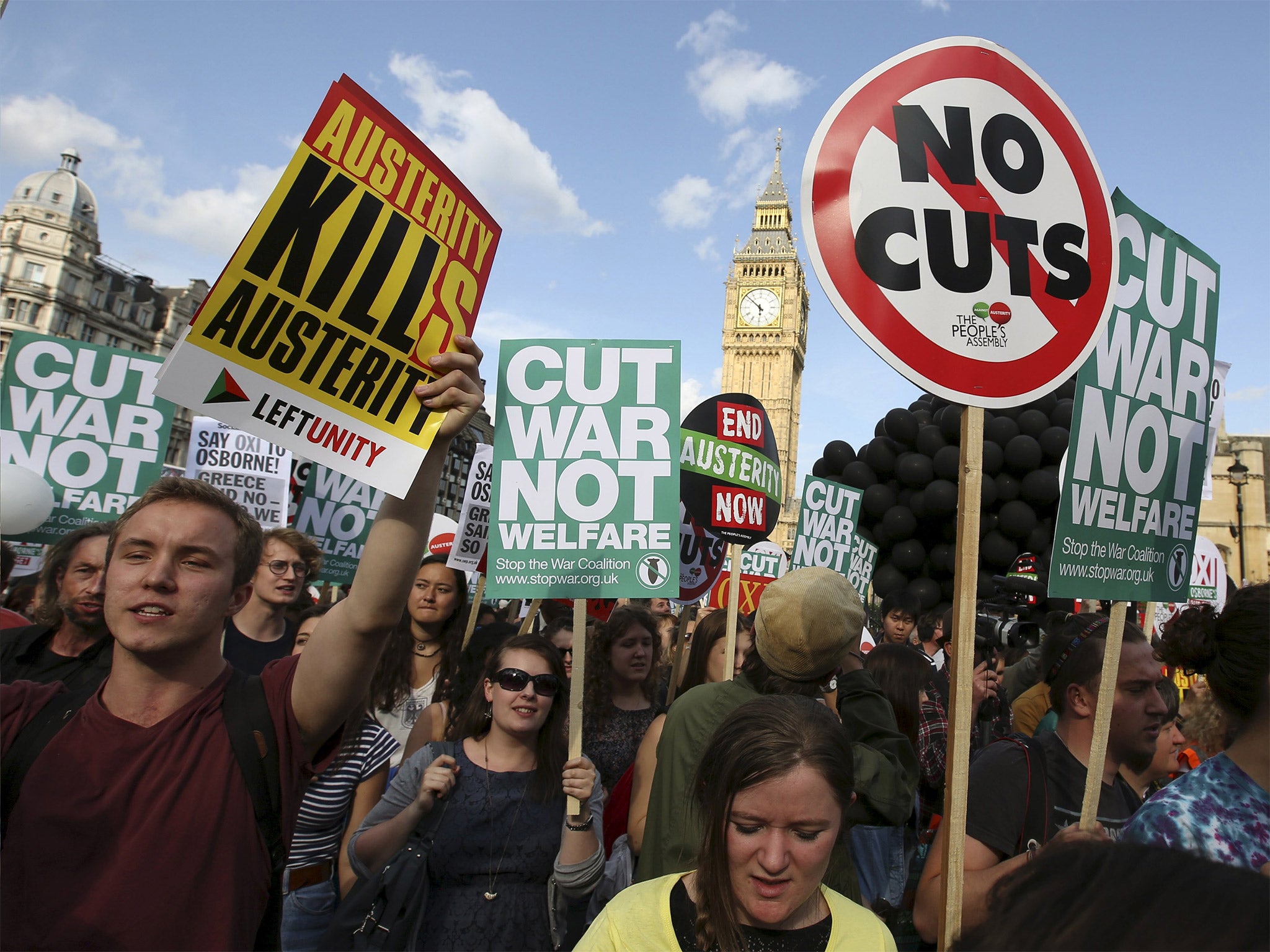 Demonstrators protest outside Parliament after the Chancellor delivered his budget