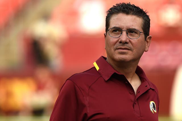 <p>Washington Redskins owner Daniel Snyder watches the New England Patriots play the Washington Redskins during the NFL preseason in 2014.</p>