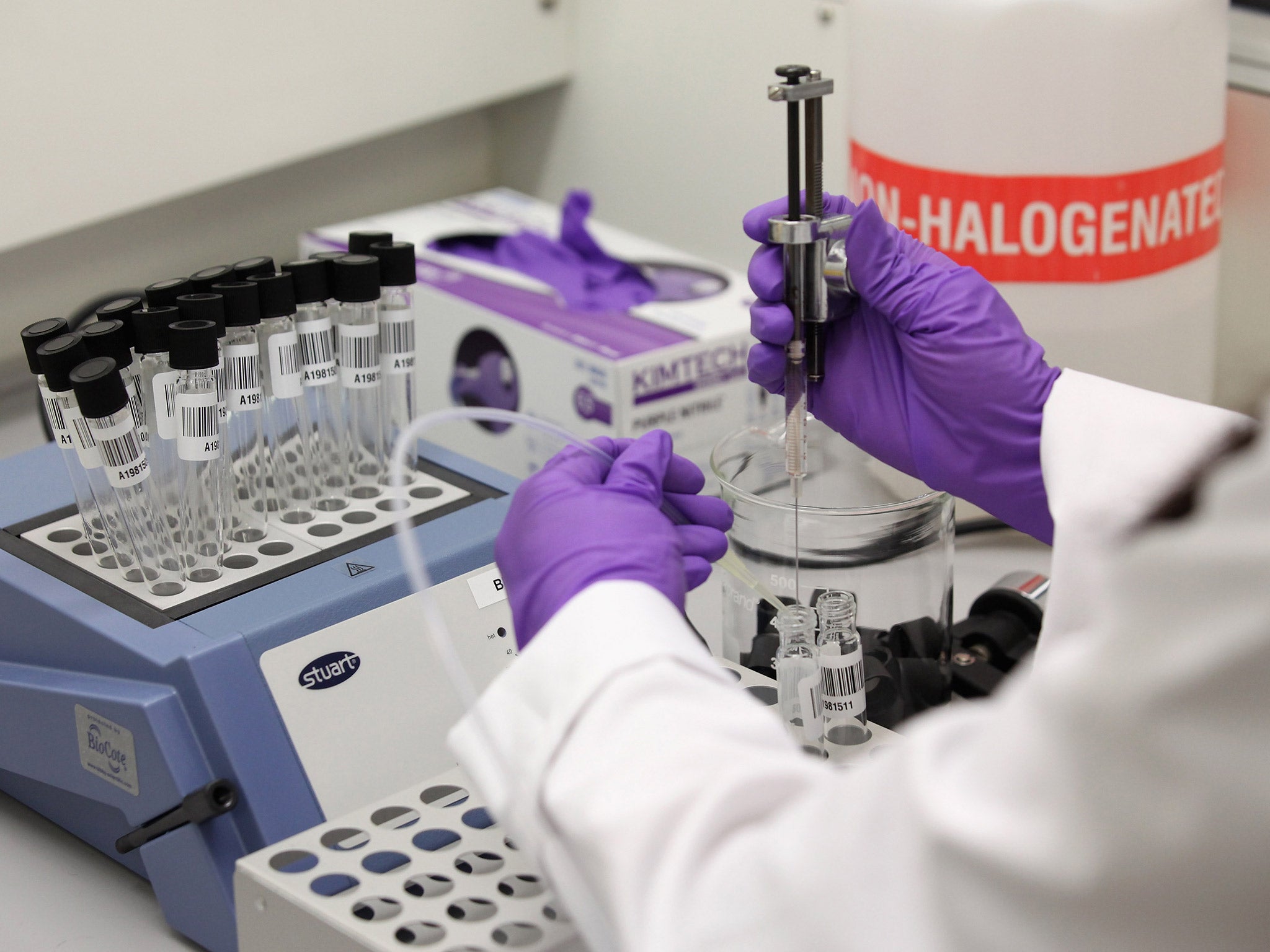 An analyst prepares a sample for testing in the anti-doping laboratory which tested athlete's samples from the London 2012 Games