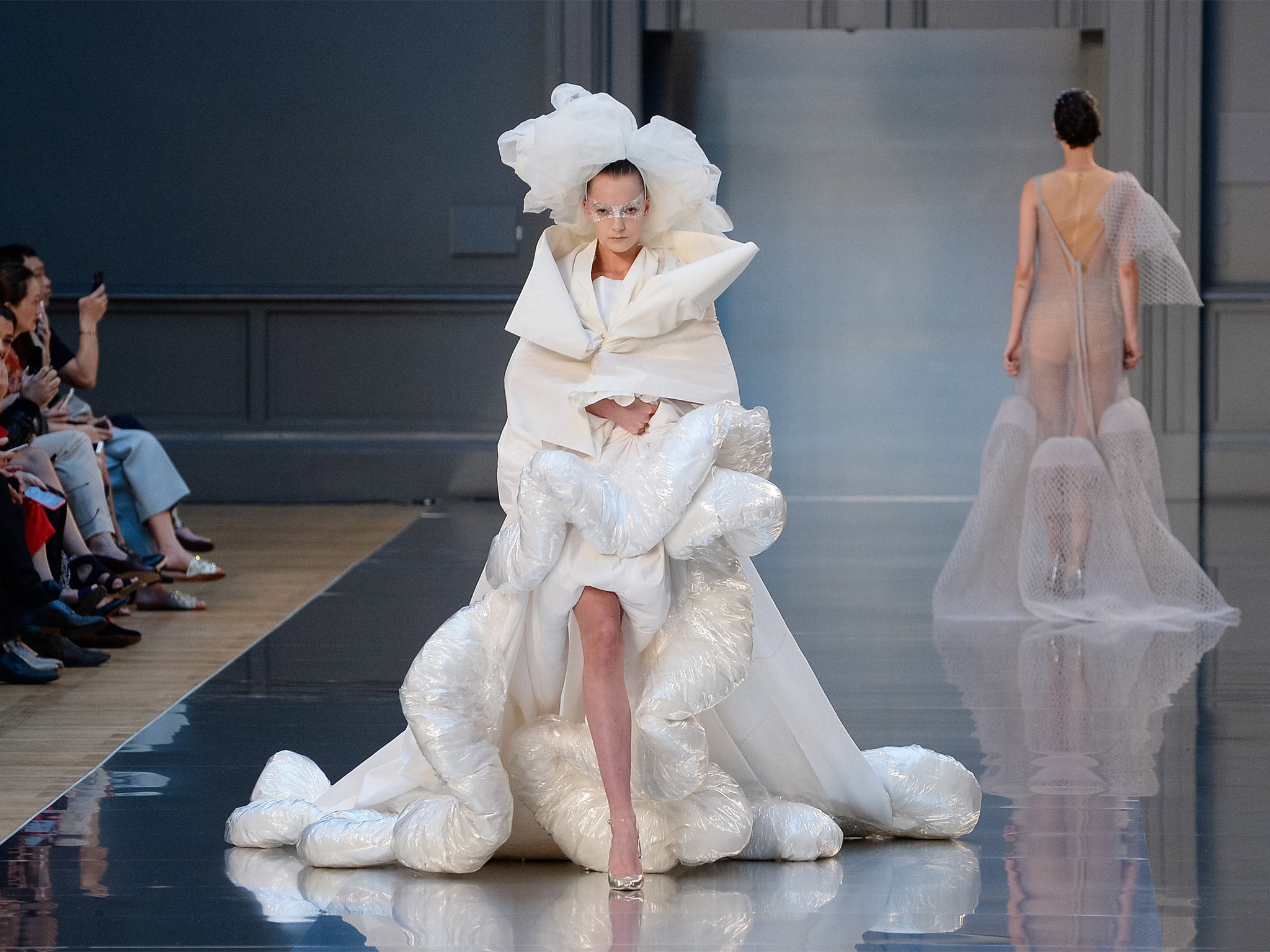 A model displays a creation by British designer John Galliano for