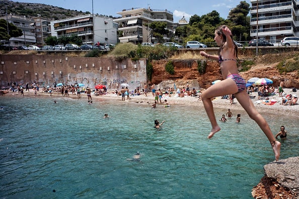 Students will be filling Greek beaches this summer, like this one in Athens