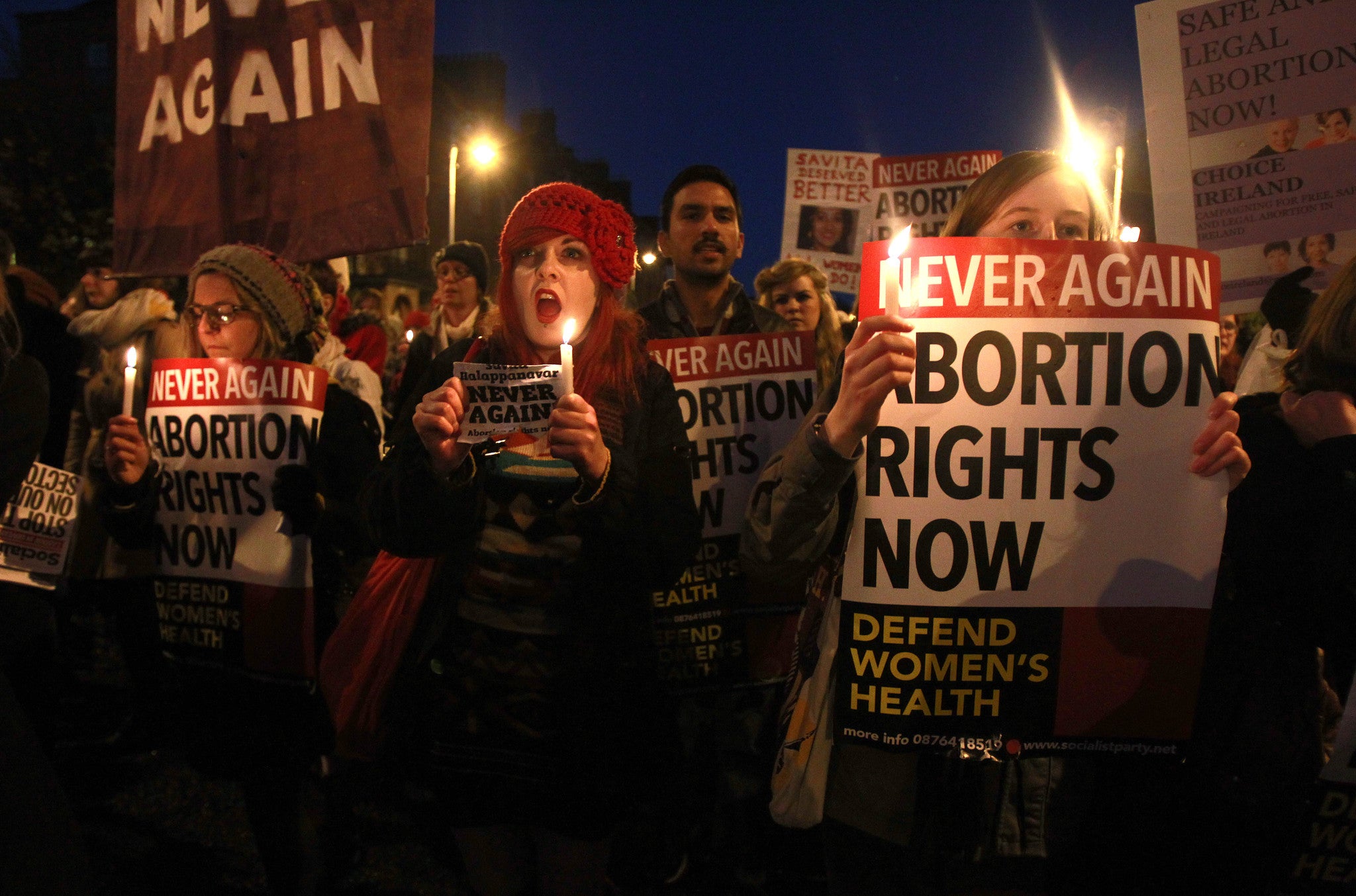 Protesters march towards the Dail in Dublin, in remembrance of Savita Halappanavar, who died after she was denied an abortion in 2012