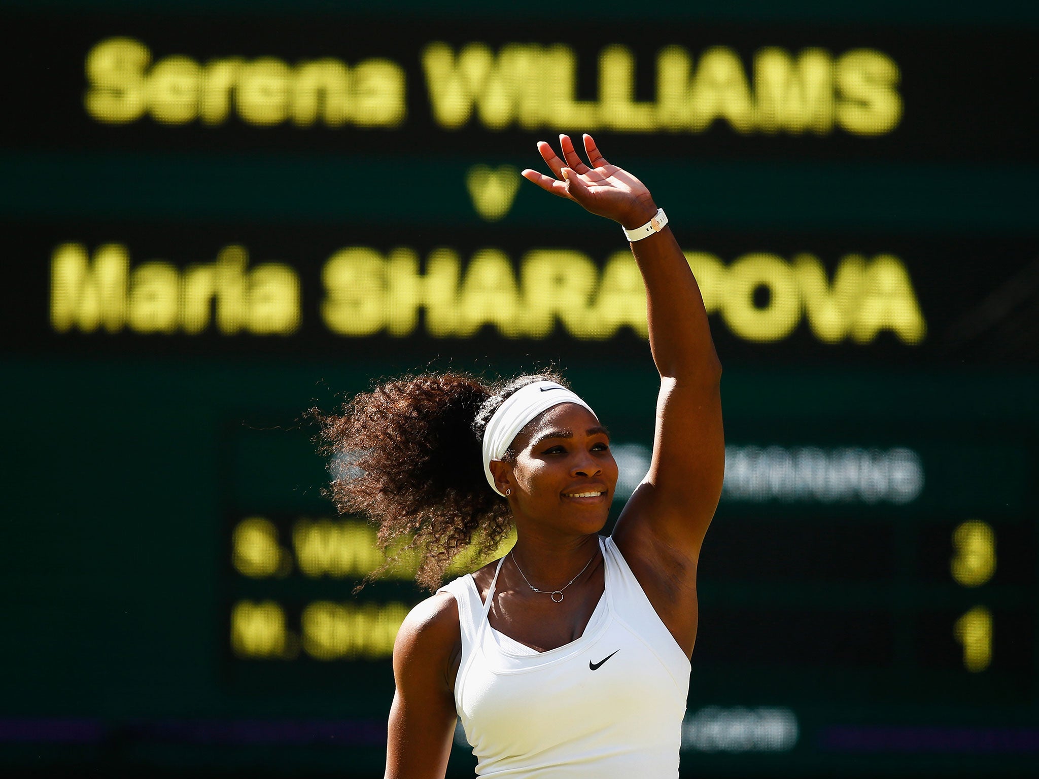 Serena Williams celebrates victory over Maria Sharapova in the semi-finals