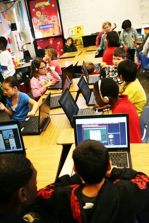 The children put the computers - which were donated by Sony - to use (via Monarch School San Diego/Facebook)