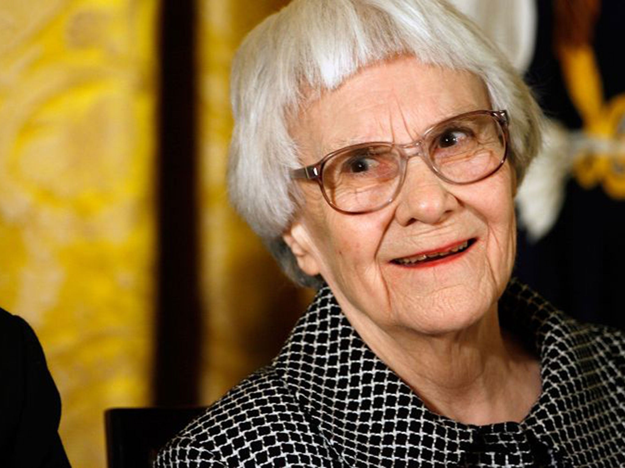 Pulitzer Prize winner and "To Kill A Mockingbird" author Harper Lee smiles before receiving the 2007 Presidential Medal of Freedom