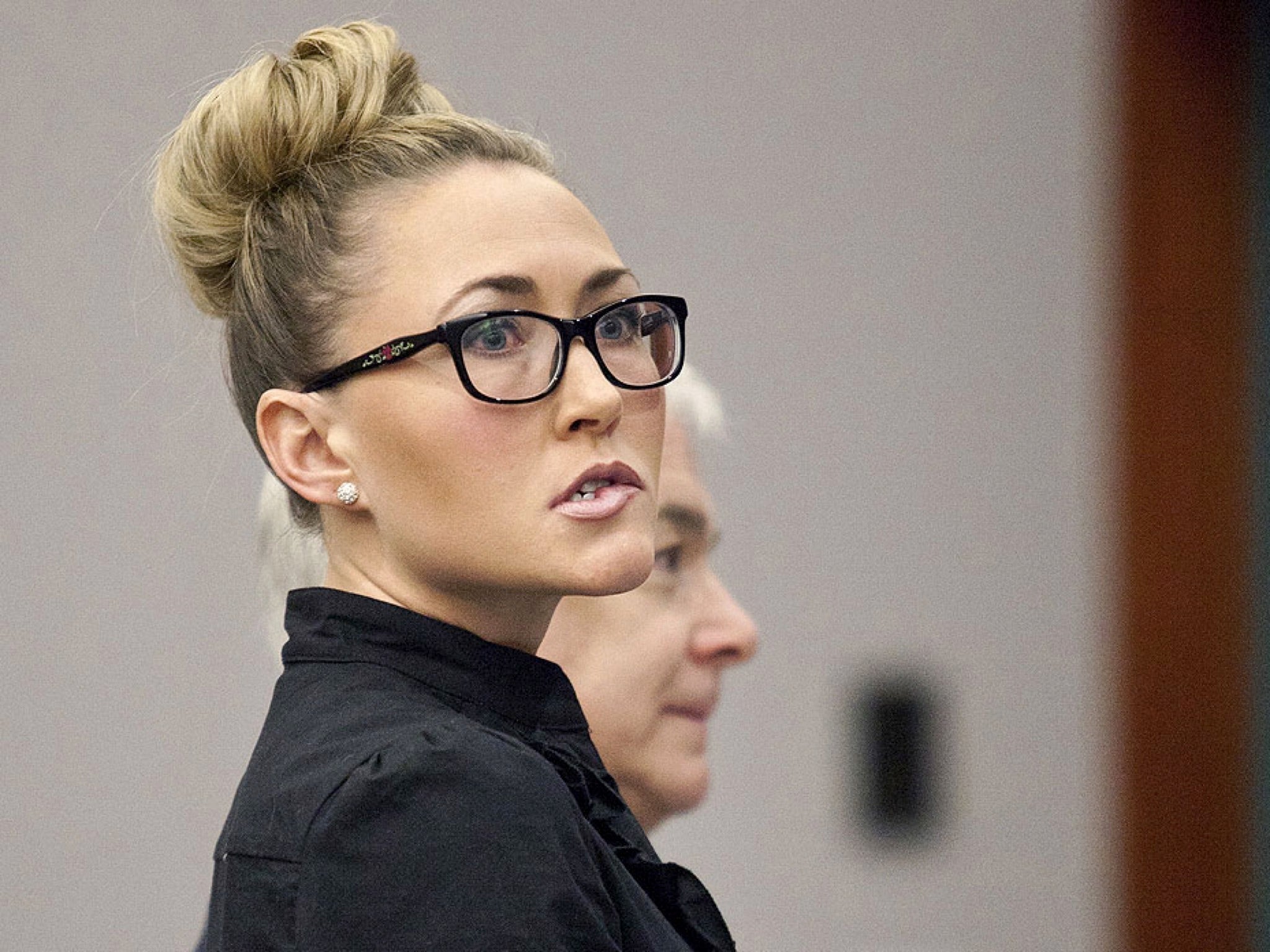 Brianne Altice weeps in court