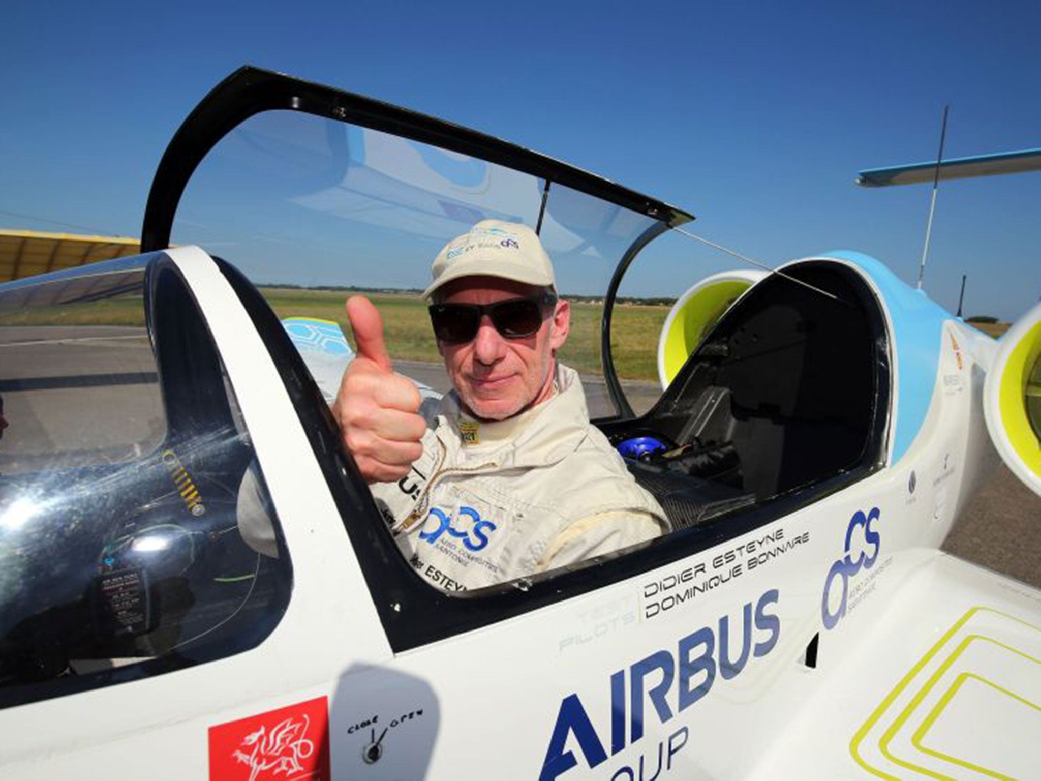 Pilot Didier Estyene after landing the E-Fan electrically powered plane in Calais, France, following his successful crossing of The Channel from Lydd Airport