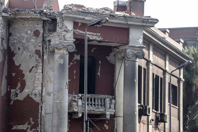 The red-facaded Italian Consulate was seriously damaged in the early-morning blast