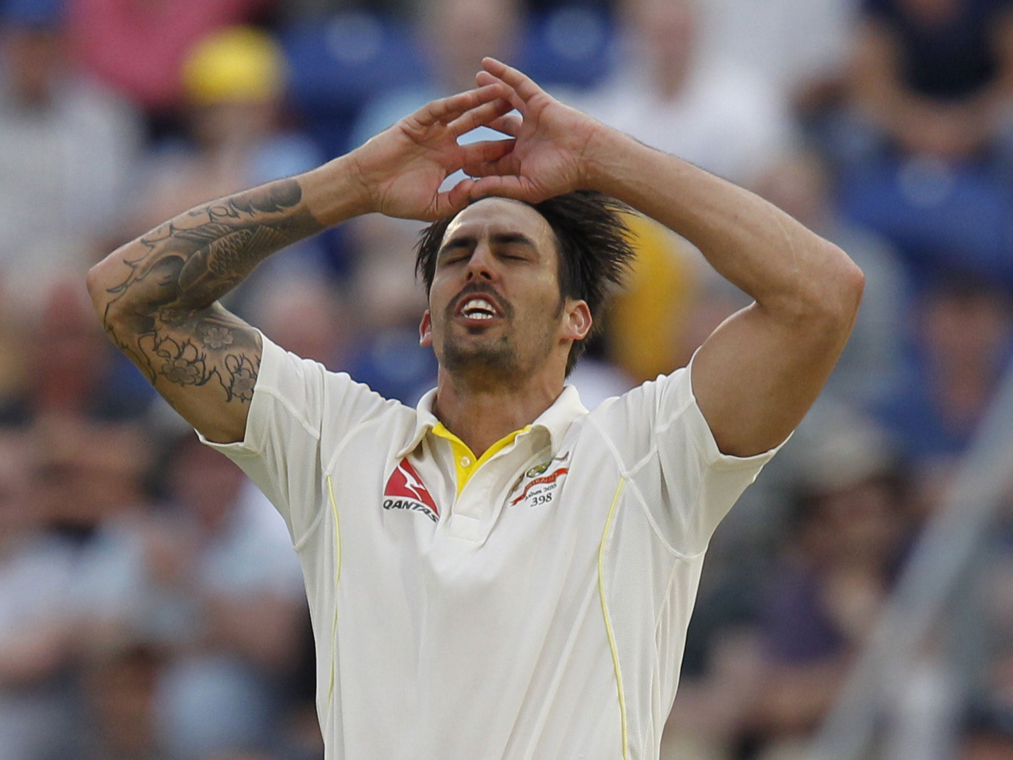 Mitchell Johnson reacts to a missed chance in the second innings