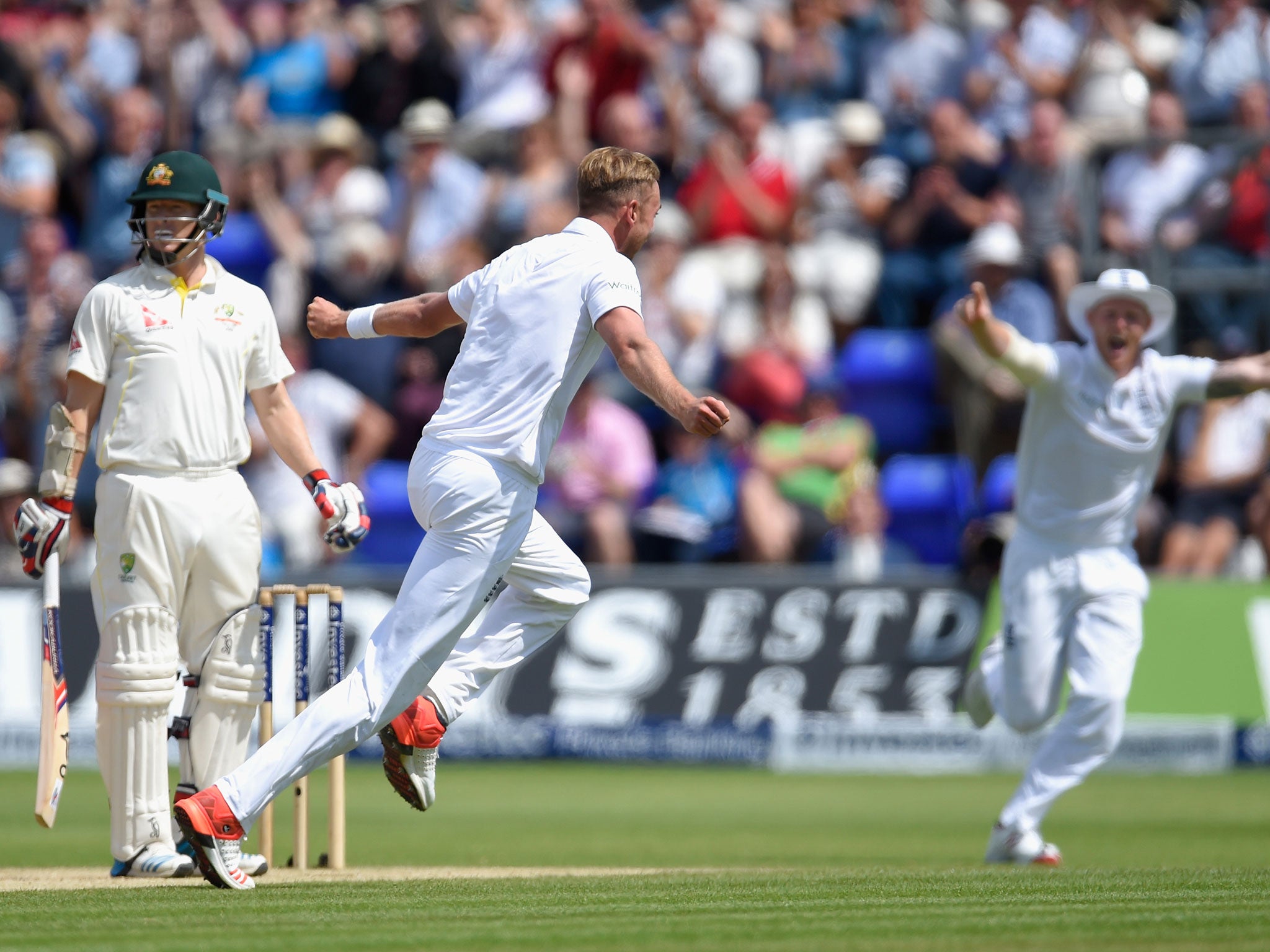 Stuart Broad runs off in celebration after having Chris Rogers caught for 10