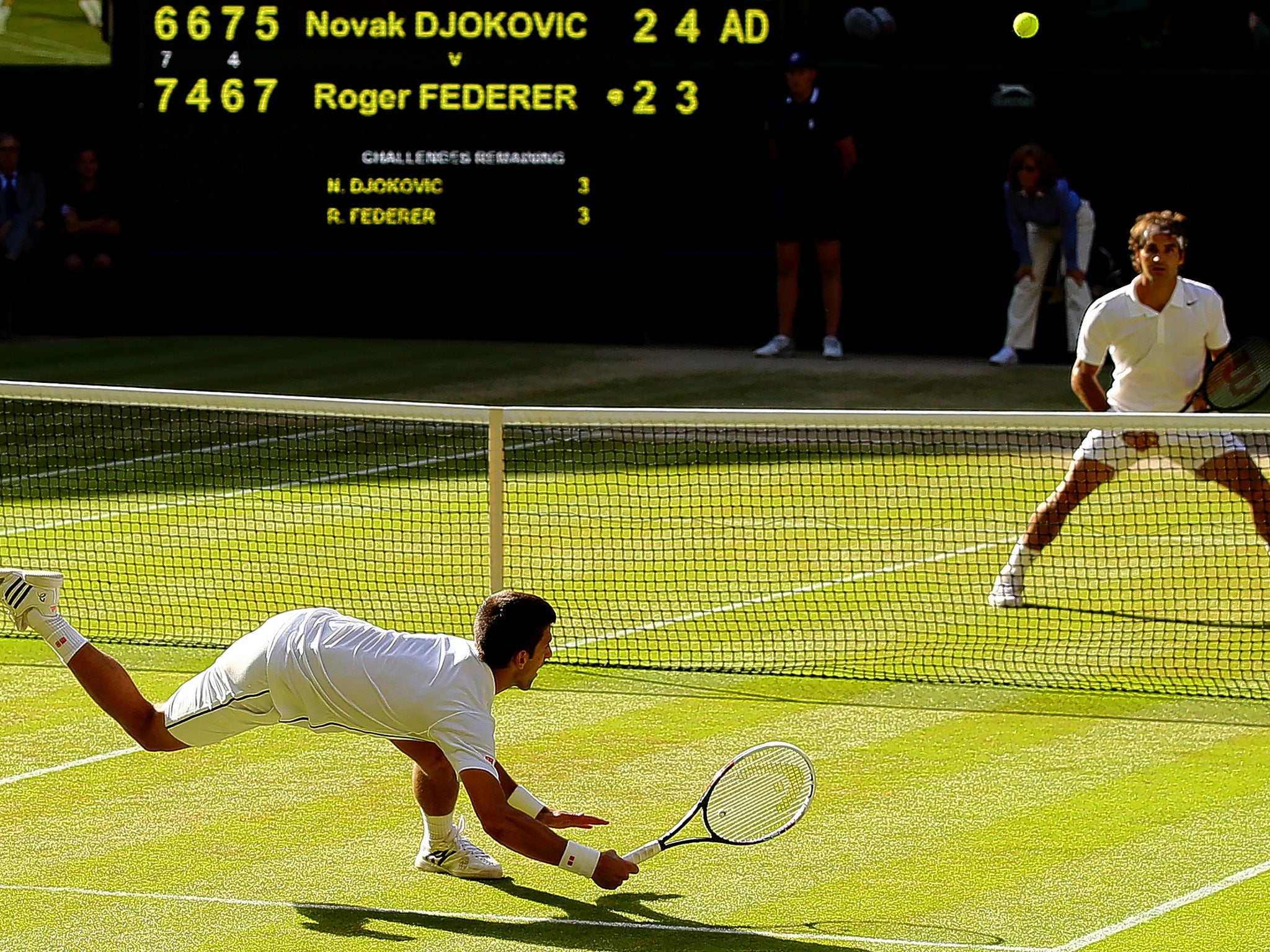 Novak Djokovic dives to make a return during last year’s final against Roger Federer