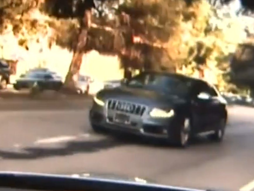 Car caught on camera driving backwards through busy streets of Los Angeles