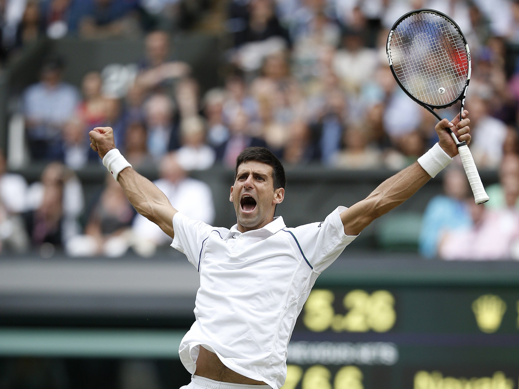 Novak Djokovic celebrates winning Wimbledon