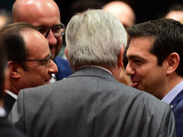 Francois Holland, Jean-Claude Juncker and Alexis Tsipras confer before the Eurozone talks today