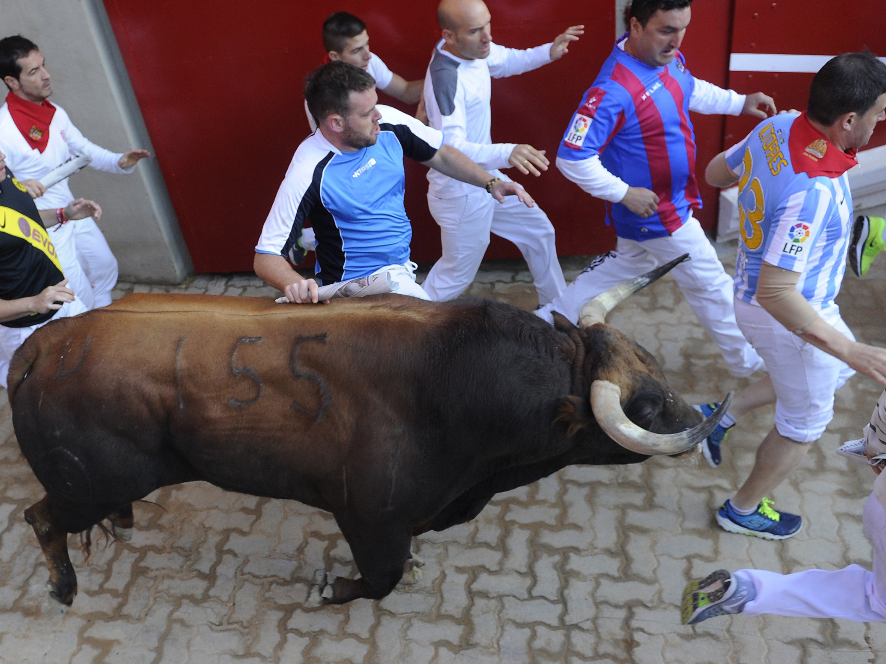 Footage from Sunday’s bull-run shows several people crushed but no one was gorged