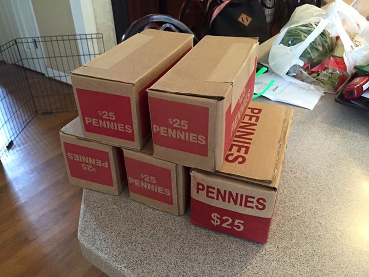 The individual boxes of 2,500 pennies Mr Coyle had to get after five trips to the bank (via Let Them Count/Facebook)