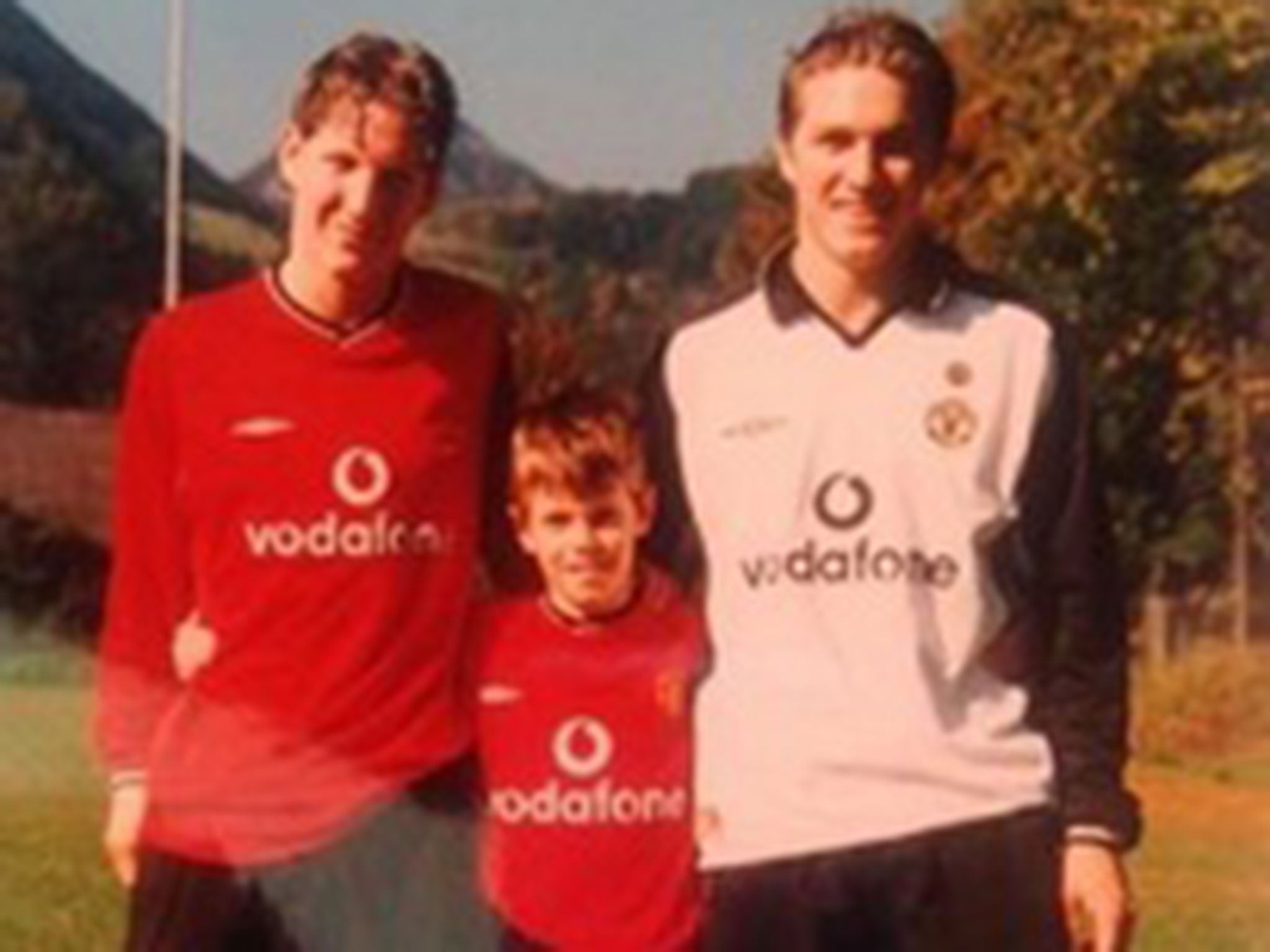 Bastian Schweinsteiger (left) pictured in a United shirt when he was younger