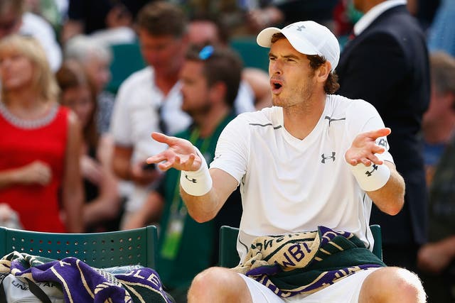 Andy Murray of Great Britain shows his frustration during the Gentlemens Singles Semi Final match against Roger Federer of Switzerland during day eleven of the Wimbledon Lawn Tennis Championships at the All England Lawn Tennis and Croquet Club in London. 