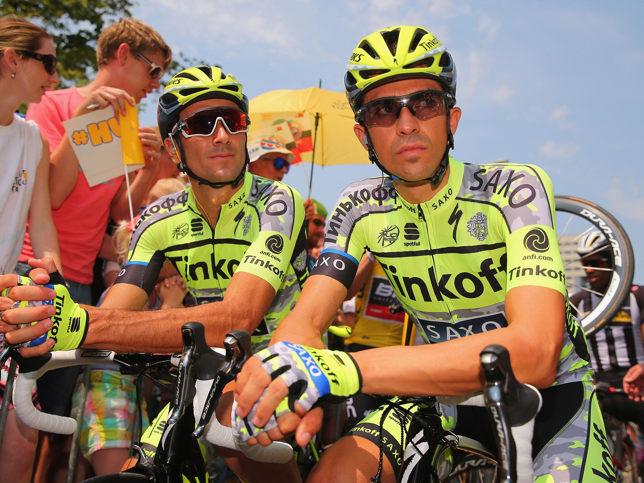 Basso (right) next to team-mate Alberto Contador